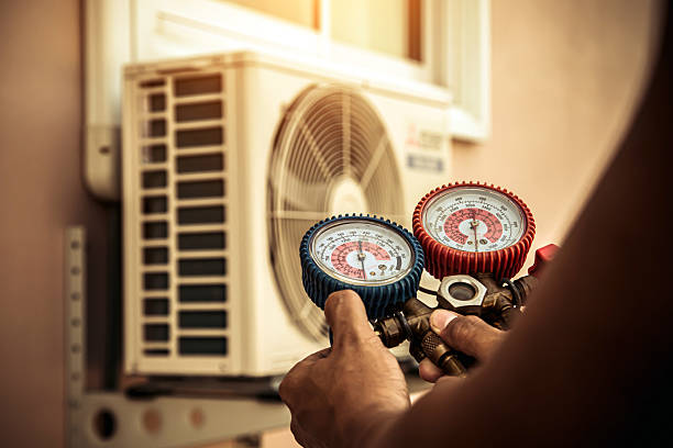 Professional Air Conditioning Service technician working in Blue Ridge, GA